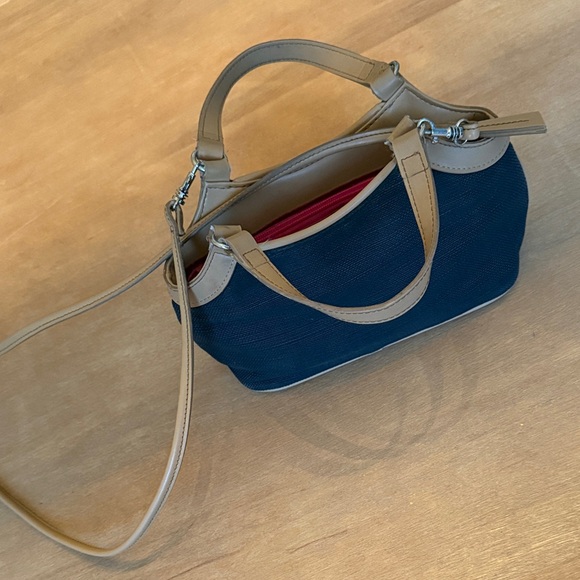 Etienne Aigner Handbags - Etienne Aigner Black Linen feel and Tan details Crossbody Bag. Cute little bag!